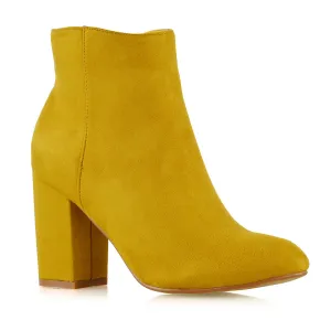 PEACHES CHUNKY BLOCK HIGH HEEL ZIP UP ANKLE WINTER BOOTS IN MUSTARD